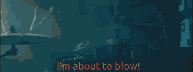 a person playing drums with the words " i 'm about to blow " in red