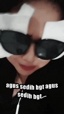 a woman wearing sunglasses has a bandage on her head