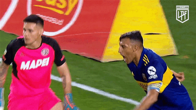 a soccer player in a pink shirt that says mapei on it