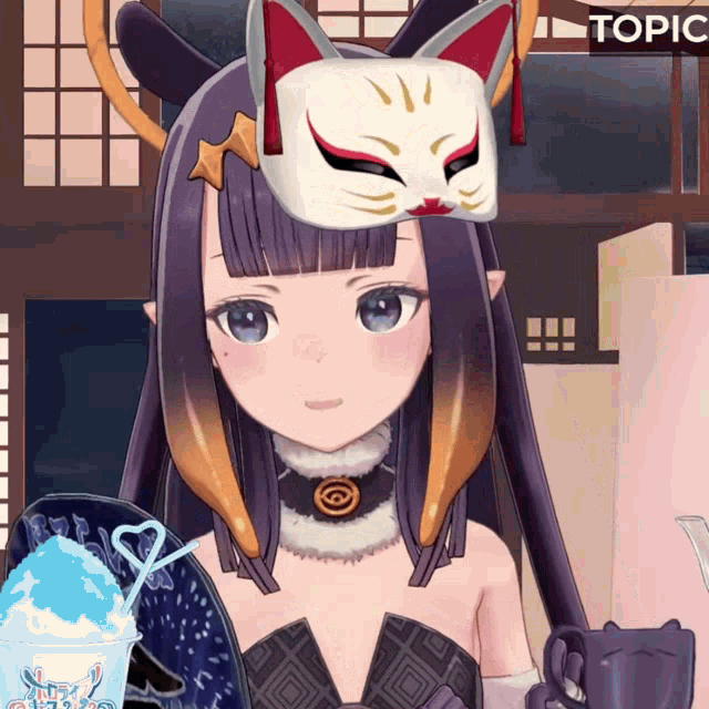 a girl wearing a cat mask is holding a cup of shaved ice
