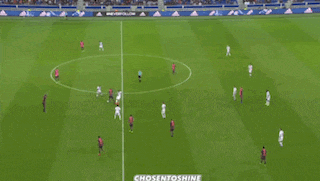a soccer field with hyundai advertisements on the side
