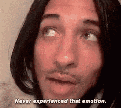 a man with long hair and a beard is saying never experienced that emotion .