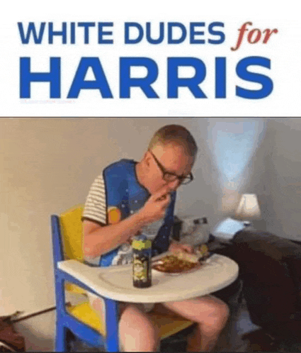 a man in a diaper is sitting in a baby chair eating food .