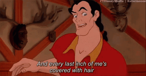 a cartoon character from beauty and the beast is covering his face with his hands .