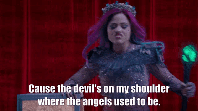 a woman with purple hair and a crown on her head says " cause the devil 's on my shoulder