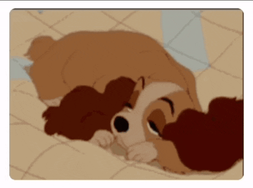 lady and the tramp dog laying on the floor