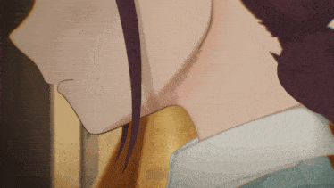 a close up of a woman 's neck with a white shirt
