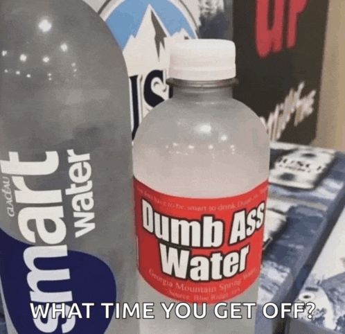 a bottle of dumb ass water is next to a smart water bottle