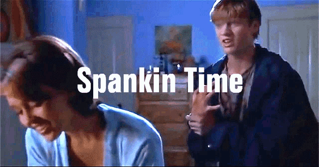 a man and a woman are standing next to each other with the words spankin time behind them