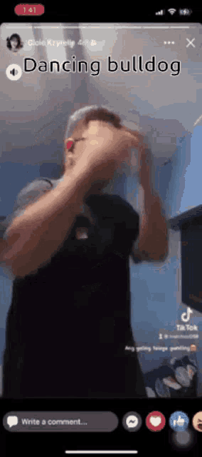 a man is dancing in a video that says dancing bulldog on the bottom