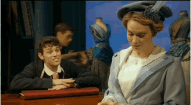 a man and a woman are sitting next to each other