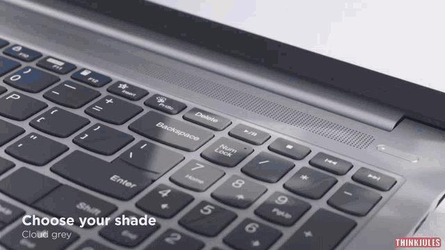 a close up of a laptop keyboard with the words choose your shade below it
