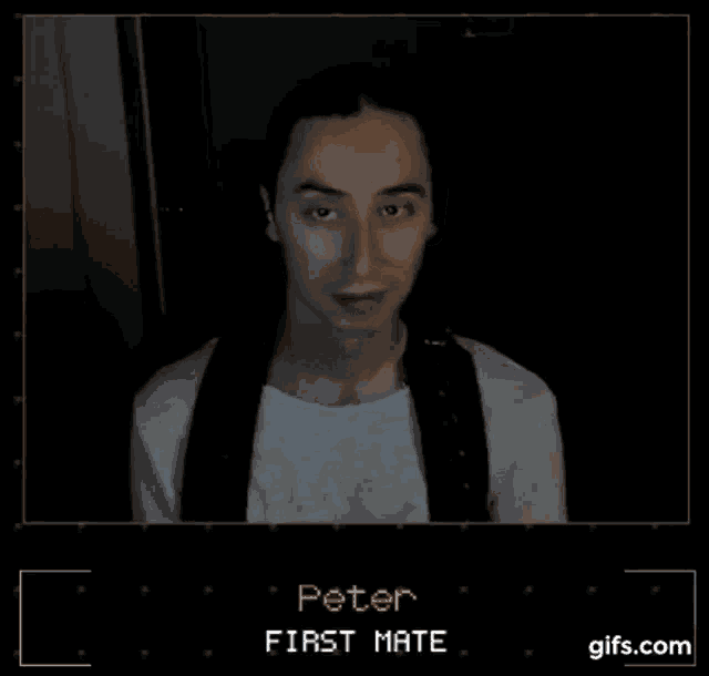 a man with long hair is sitting in front of a screen with the words interesting first mate on it