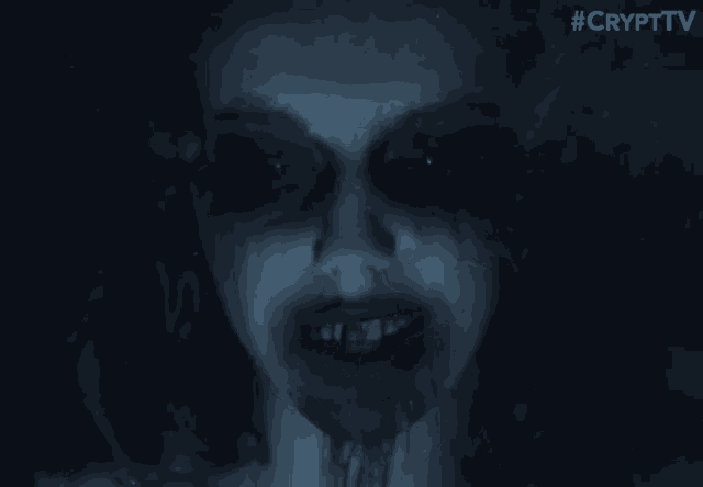 a close up of a person 's face with a #crypttv watermark