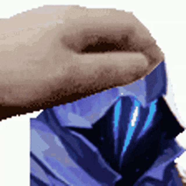 a hand is reaching into a blue foil bag