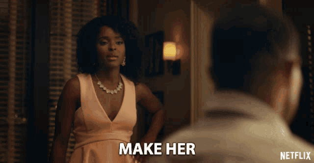 a netflix ad shows a woman in a pink dress looking at a man in a white shirt