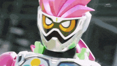 a close up of a cartoon character wearing a pink helmet and goggles .
