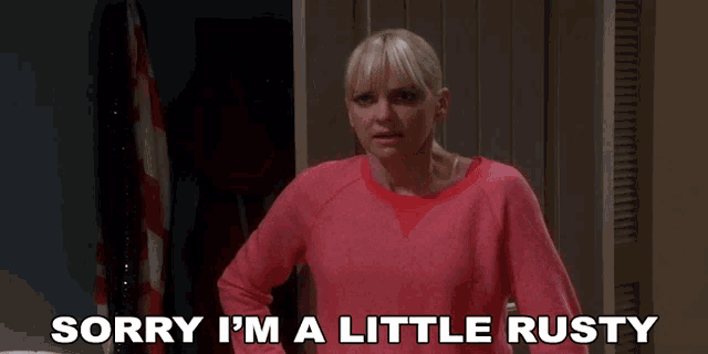 a woman says sorry i 'm a little rusty in front of a closet