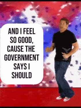 a man is dancing in front of a sign that says " and i feel so good "