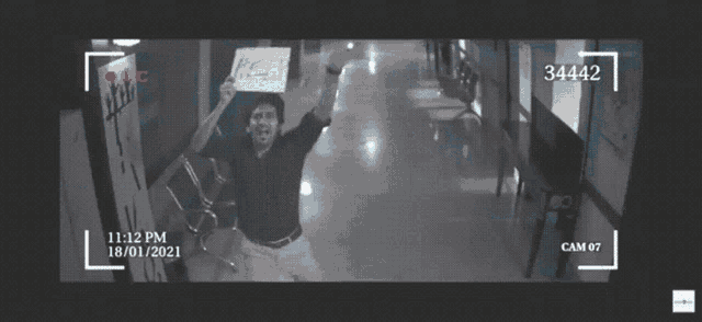 a man holding up a sign that says help