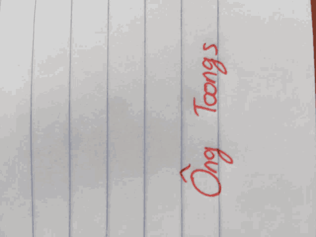 a piece of paper with ong toongs written in red