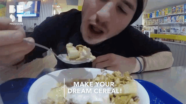 a man is eating cereal with the words make your dream cereal on the bottom