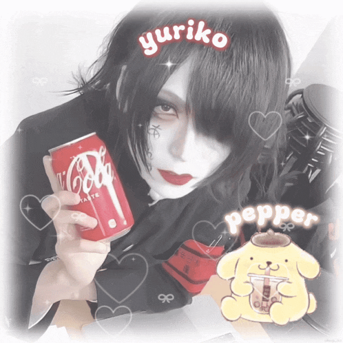 a person holding a can of coca cola with yuriko written on the top