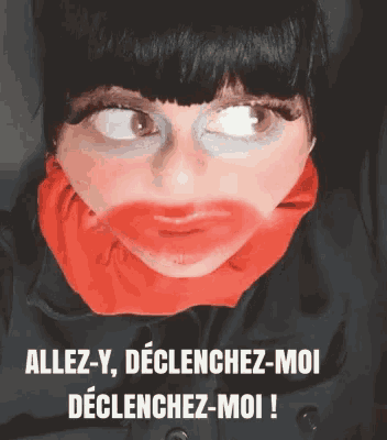 a woman with a red scarf around her neck is making a funny face with the words allez-y declenchez-moi