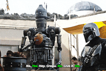 a man in a helmet talks to a robot that says no yes hey crogu no give it no