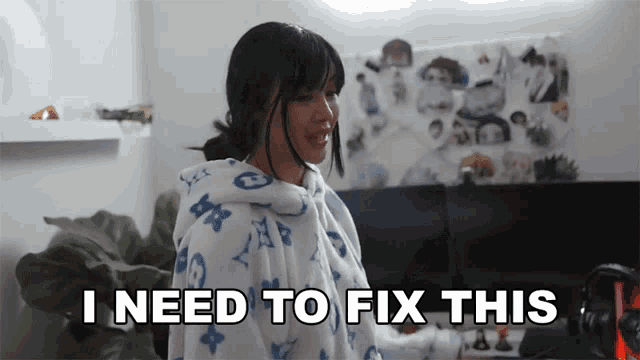a woman is wrapped in a blanket and says i need to fix this .