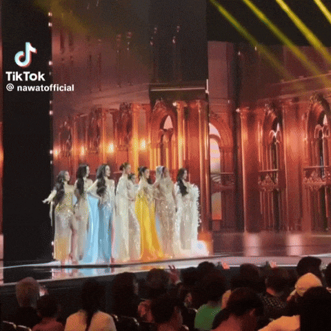 a group of women are standing on a stage with a tiktok watermark