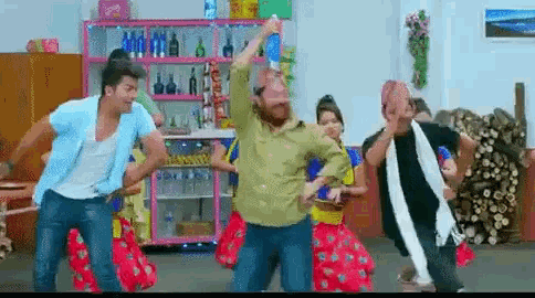 a group of people are dancing in a room