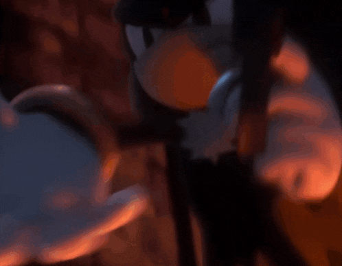 a close up of a person holding a gun
