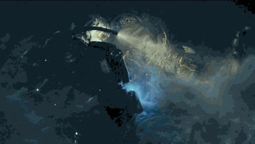 a person is swimming in a cave in the ocean