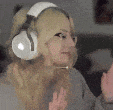 a woman wearing headphones with a microphone on her head