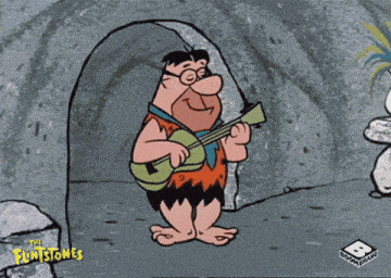 a cartoon of flintstone playing a guitar with a looney tunes logo