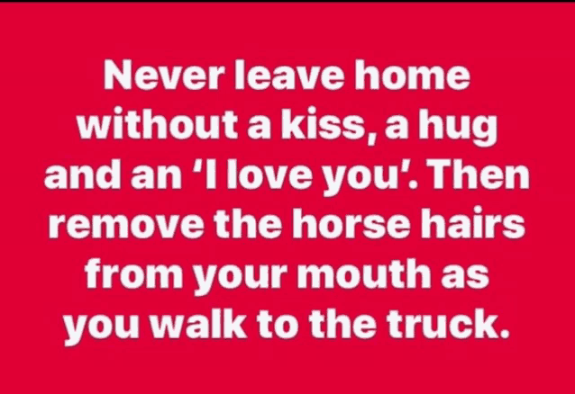 a red sign that says " never leave home without a kiss , a hug and an ' i love you ' "