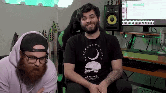 a man wearing a black shirt that says blackcraft on it