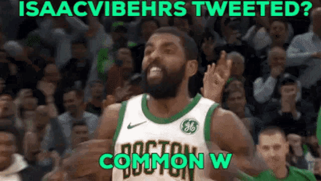 a basketball player wearing a green and white jersey with boston on it