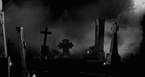 Cross Headstone At A Spooky Cemetery GIF - Cross The Cross Cross Headstone GIFs
