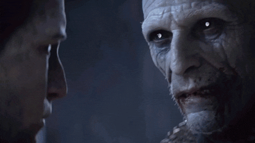 a close up of a monster with glowing eyes