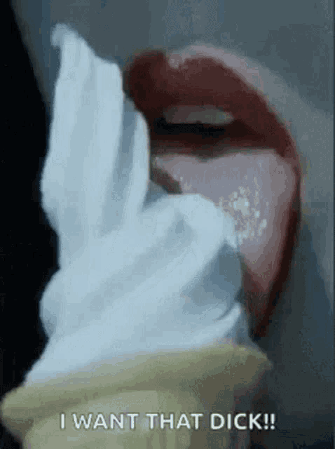 a woman is eating an ice cream cone with her tongue out and the words `` i want that dick '' .