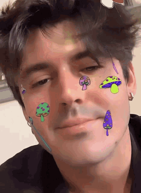a close up of a man 's face with mushrooms on his face