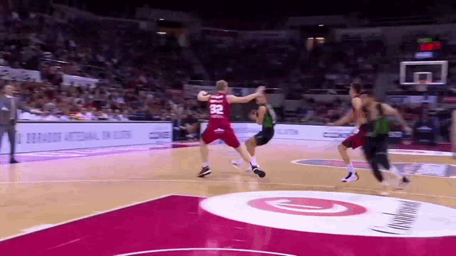 a basketball player with the number 32 on their jersey