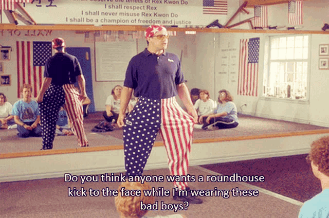 a man standing in front of a mirror with the words do you think anyone wants a roundhouse kick