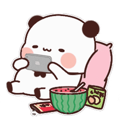 a panda bear is sitting on a couch with a bowl of watermelon and a phone .