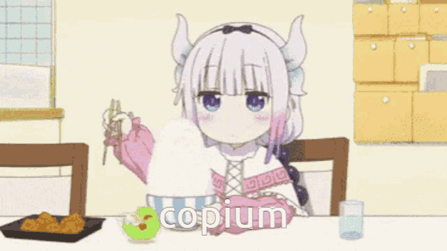 a girl with horns is sitting at a table with copium written on the screen