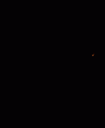 a close up of a man 's face in the dark