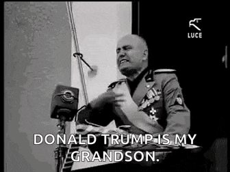 a man in a military uniform is giving a speech and saying `` donald trump is my grandson . ''
