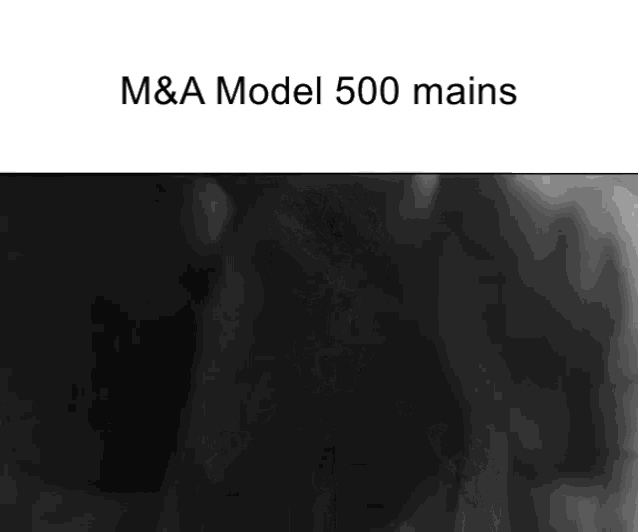a black and white photo of a man 's chest with the words m & a model 500 mains